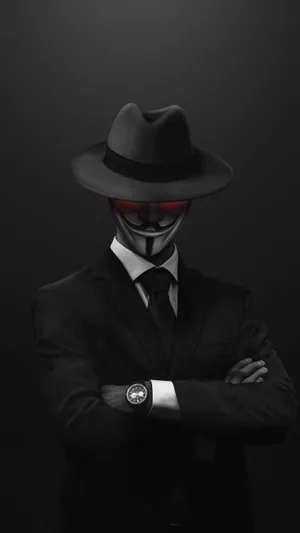A Man In A Suit And Hat Wallpaper