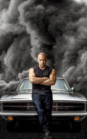 A Man Is Standing On A Car With Smoke Coming Out Of It Wallpaper