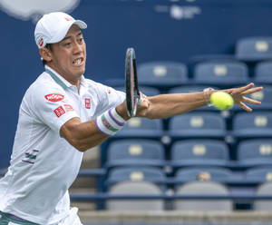 A Man Playing Tennis Wallpaper