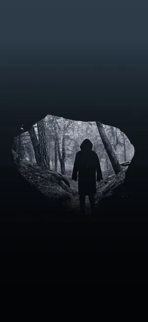A Man Wearing A Coat With Glowing Eyes Standing In The Dark, Inspired By The Netflix Series
