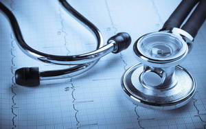 A Medical Stethoscope With Pulse Rate Result Wallpaper