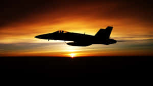 A Military Plane Soaring In The Sky With American Flags Wallpaper