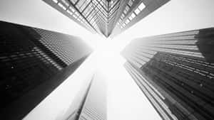 A Minimalist And Sleek Laptop Sitting On A White Background, Perfect For Your Daily Tasks. Wallpaper