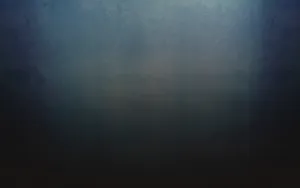 A Minimalist Grey Desktop Setup Wallpaper