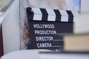 A Movie Clapper Board Ready For Action Wallpaper