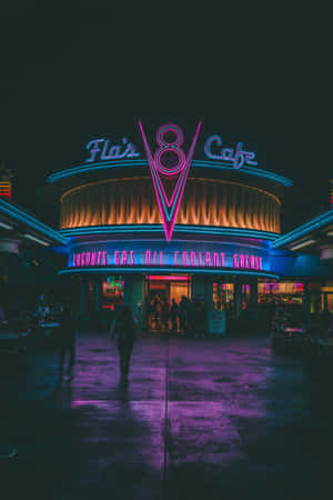 A Neon Sign For The Fl8 Cafe At Night Wallpaper