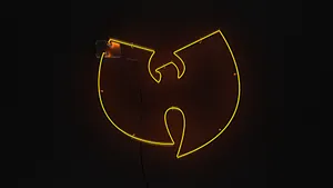 A Neon Sign With A Wu Tang Logo On It Wallpaper
