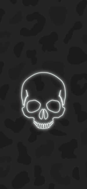 A Neon Skull On A Black Background Wallpaper