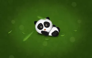 A Panda Enjoying A Day Out In The Garden Wallpaper