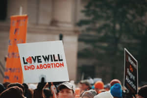 A Passionate Anti-abortion Protest Sign Wallpaper