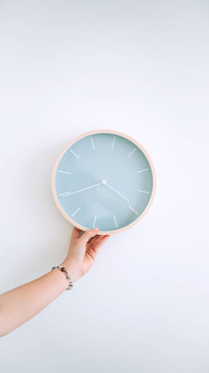 A Pastel Blue Clock Wallpaper