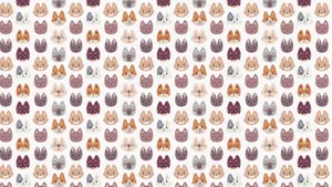 A Pattern Of Foxes With Orange And Brown Colors Wallpaper
