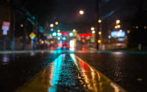 A Peaceful View Of The Hustle And Bustle Of The City Street Wallpaper