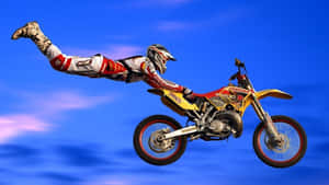 A Person Doing A Stunt On A Dirt Bike Wallpaper