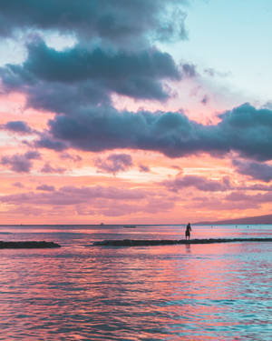 A Person Is Standing On The Beach Wallpaper