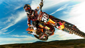 A Person Riding A Dirt Bike Wallpaper