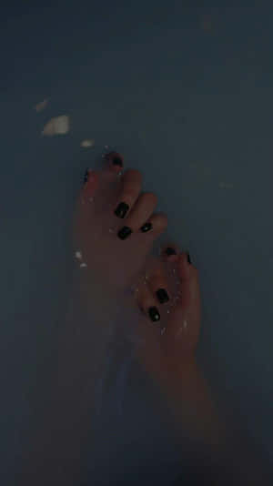 A Person's Feet In A Bath Tub Wallpaper