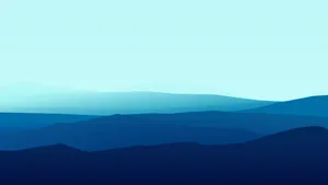 A Picture Of A Minimalist Mountain With Calming Blue Hues Wallpaper