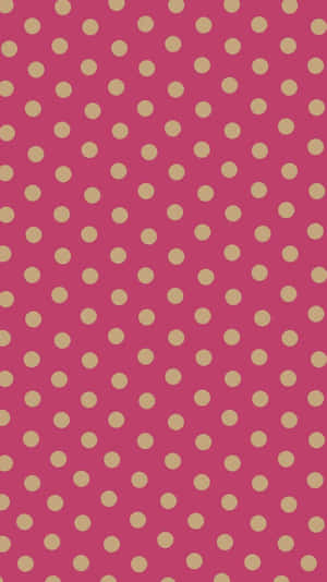 A Pink And Gold Polka Dot Pattern Wallpaper