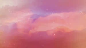 A Pink And Purple Sky With Clouds Wallpaper