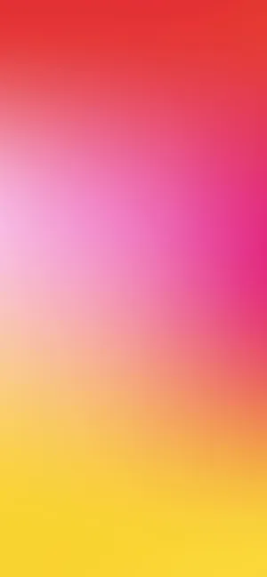 A Pink And Yellow Gradient Background Wallpaper
