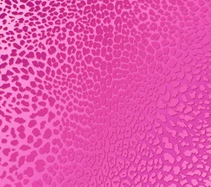 A Pink Background With A Pattern Of Animal Spots Wallpaper