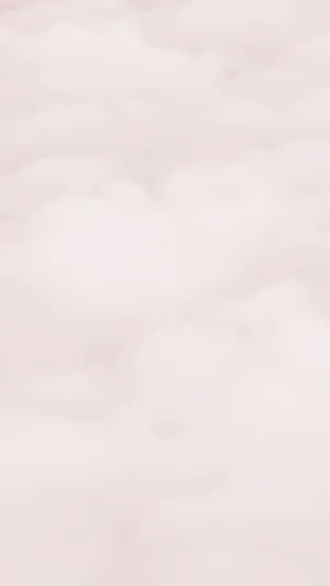 A Pink Cloud With A Plane Flying Over It Wallpaper