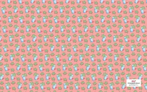 A Pink Fabric With Blue And Green Flowers Wallpaper