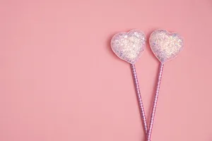 A Pink, Glittery Cascade Of Heart-shaped Confetti Wallpaper