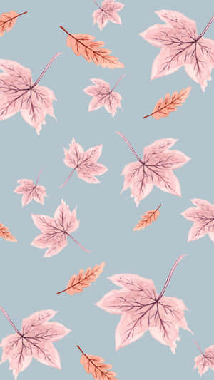 A Pink Leaf Pattern On A Blue Background Wallpaper