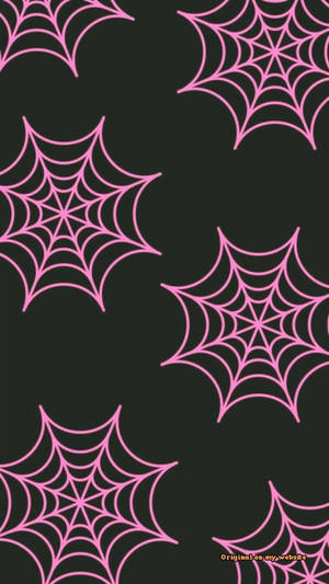 A Pink Spider Web Pattern On Black Background Wallpaper