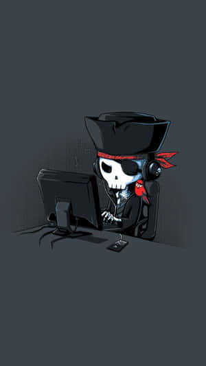 A Pirate Skull Sitting At A Computer Wallpaper
