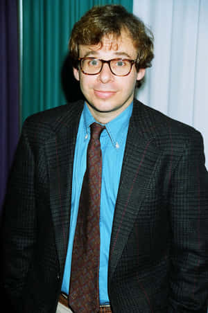 A Portrait Of Rick Moranis, The Popular Actor And Comedian Wallpaper