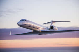 A Private Jet Gearing Up For Departure Wallpaper