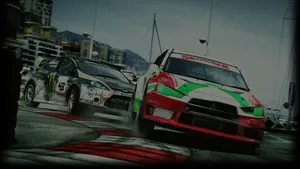 A Race Car Driving On A Track Wallpaper
