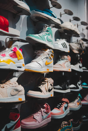 A Rack Of Shoes On A Shelf Wallpaper