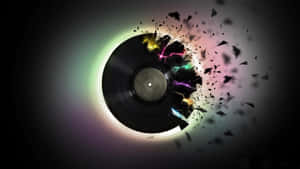 A Record Is Broken Into Pieces In A Dark Room Wallpaper