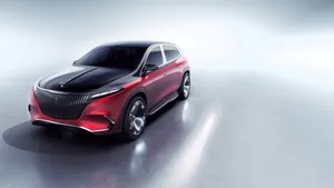 A Red And Black Concept Car Is Shown In A Studio Wallpaper