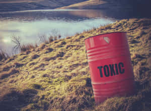 A Red Barrel With The Word Tonic On It Wallpaper