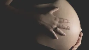 A Serene Moment Of Motherhood Wallpaper