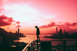 A Silhouette Of A Person Enjoying A Moment Of Contemplation Wallpaper