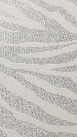 A Sleek Silver Iphone In A Modern Designed Aesthetic Wallpaper