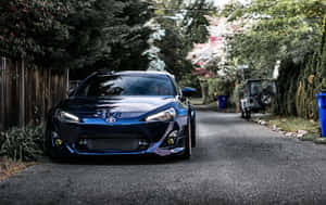 A Sleek Toyota 86 With Matte Black Finish Wallpaper