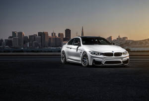 A Sleek White Bmw Laptop On A White Background Wallpaper