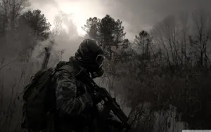 A Soldier Of The Us Military Standing Against A Beautiful Sunset. Wallpaper