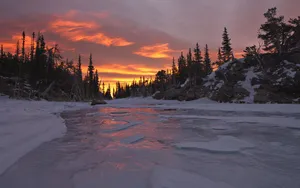A Spectacular Winter Sunset In The Mountains Wallpaper