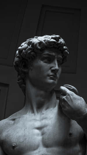 A Statue Of A Man Wallpaper