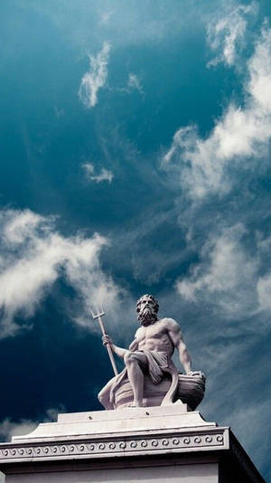A Statue On Top Of A Building Wallpaper