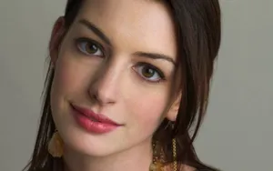 A Striking Portrait Of Anne Hathaway Wallpaper