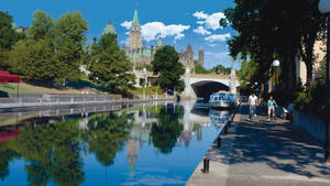 A Summer View Of Rideau Canal In Ottawa Wallpaper